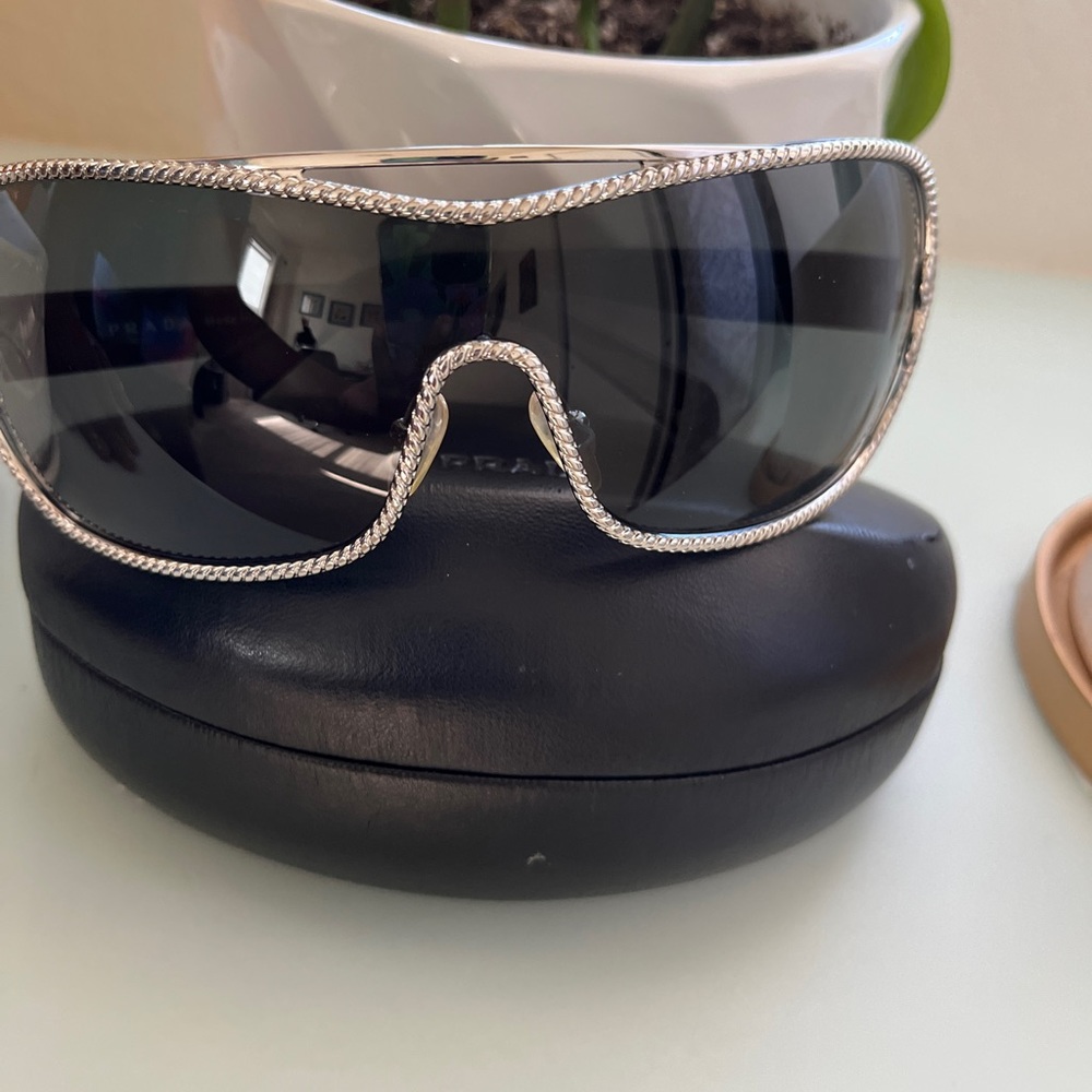 Prada Sunglasses .
